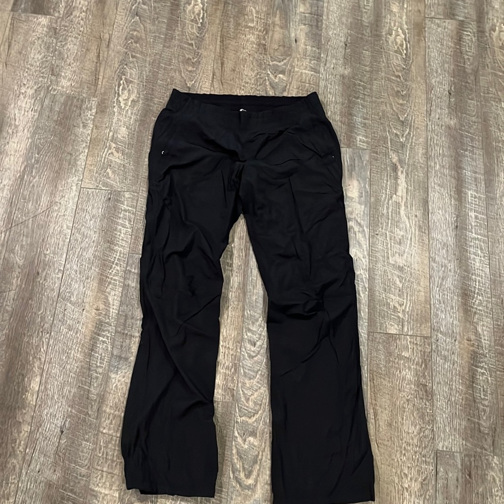 Lululemon size 10 black windbreaker pants, with leggings lining underneath